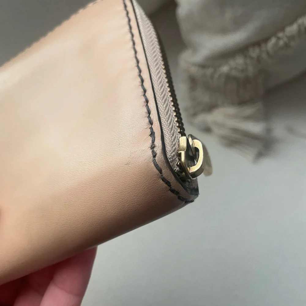 DIOR NUDE ZIP AROUND WALLET
